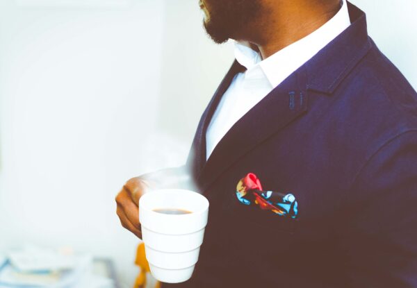 Man With Bow Drinking Coffee